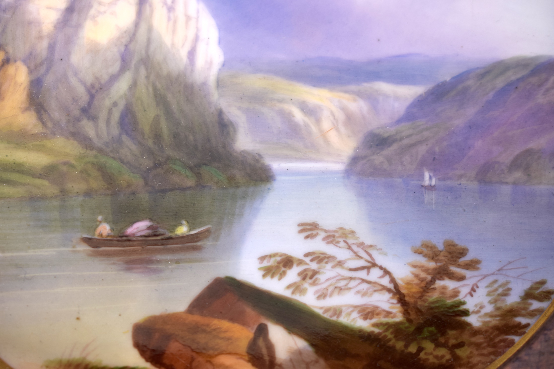 A EUROPEAN PORCELAIN PLAQUE, painted with figures in a boat in a mountainous landscape. 17 cm wide. - Bild 2 aus 3