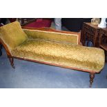 A LATE 19TH CENTURY CONTINENTAL CHAISE LONGE, upholstery with flowers. 170 cm x 60 cm.
