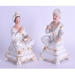 A PAIR OF EARLY 19TH CENTURY STAFFORDSHIRE FIGURES OF TURKS modelled upon gilt painted bases. 15