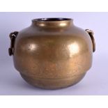 AN 18TH/19TH CENTURY MIDDLE EASTERN PERSIAN BRONZE POT engraved with foliage and vines. 24 cm x 20