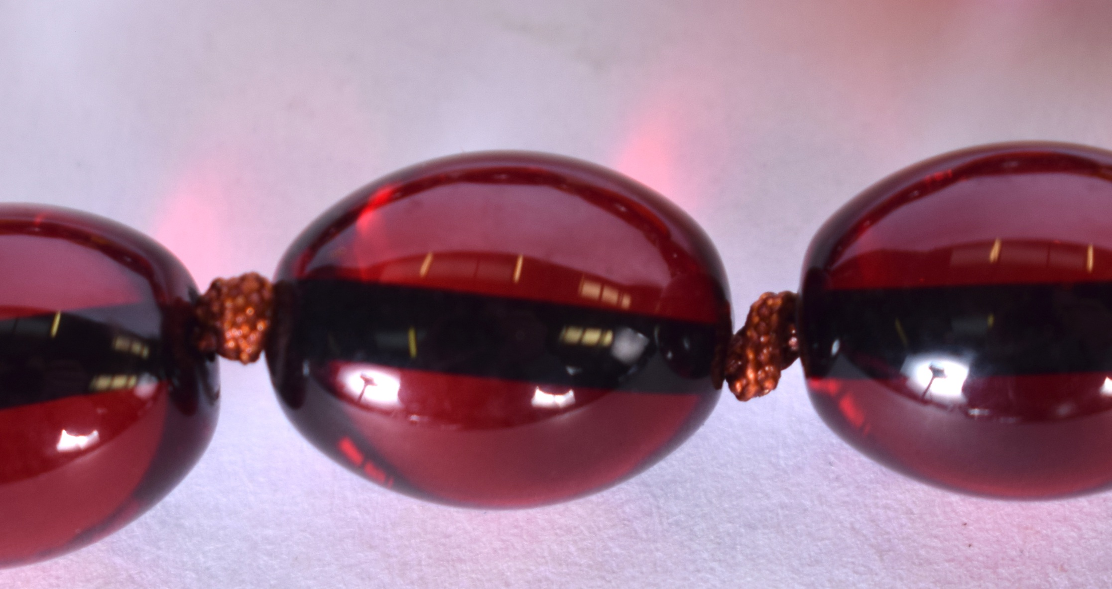 A LARGE AMBER TYPE NECKLACE, together with a similar. Largest bead 2.1 cm and total length 86 cm - Image 3 of 3