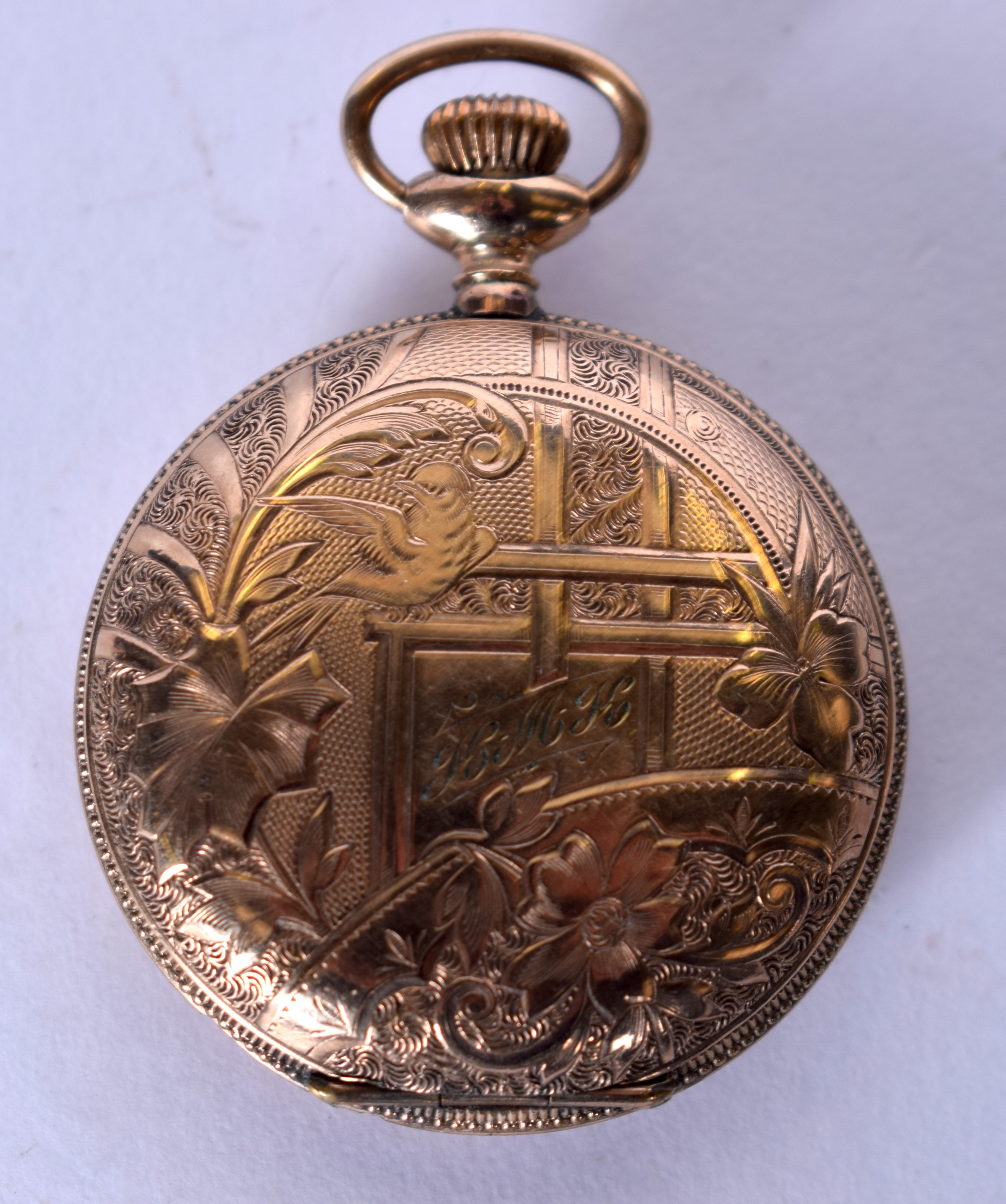 A NEW YORK STANDARD WATCH CO. YELLOW METAL POCKET WATCH, the case engraved with birds amongst - Image 2 of 4