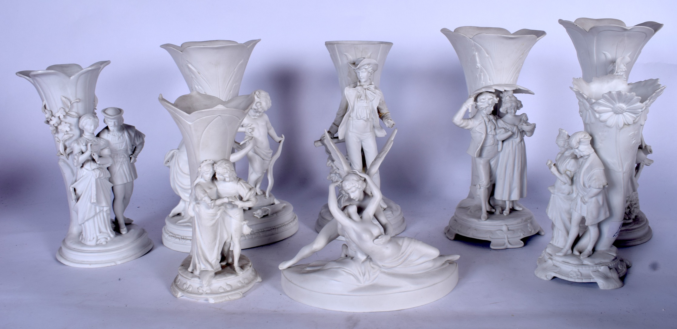 A GROUP OF PARIAN WARE SPILL VASES, mounted with figures in various pursuits, together with a