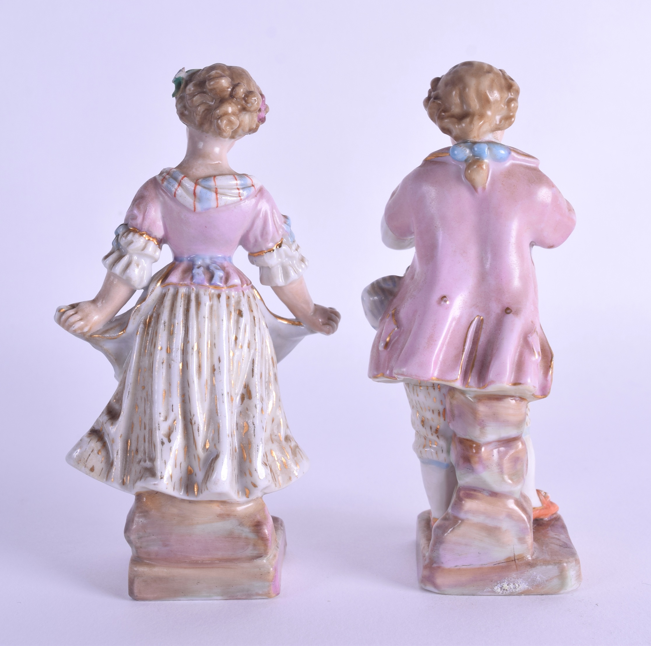 A SMALL PAIR OF 19TH CENTURY GERMAN PORCELAIN FIGURES modelled as a male and female. 12.5 cm high. - Image 2 of 3