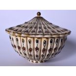 AN EARLY 20TH CENTURY PERSIAN IVORY BOX AND COVER, formed with ribbed body and decorated with