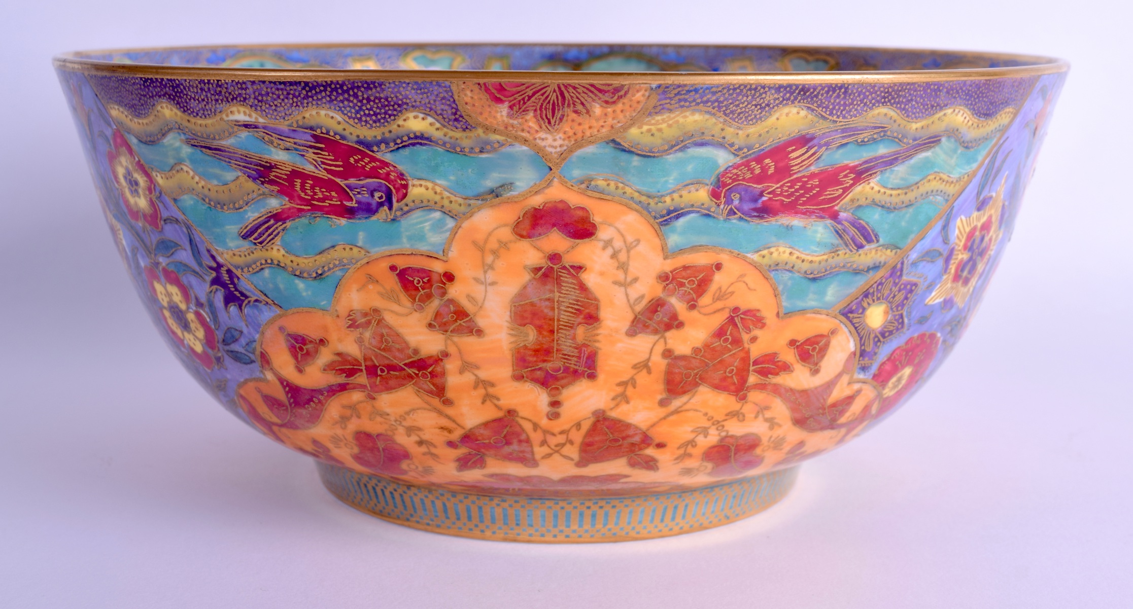 A RARE WEDGWOOD FAIRYLAND LUSTRE BOWL by Daisy Makeig Jones, painted with figures and Middle Eastern