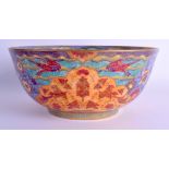 A RARE WEDGWOOD FAIRYLAND LUSTRE BOWL by Daisy Makeig Jones, painted with figures and Middle Eastern