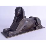 A LATE 19TH CENTURY FRENCH EGYPTIAN REVIVAL BRONZE SPHINX modelled upon a rectangular base