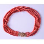 AN 18CT GOLD MOUNTED CORAL NECKLACE. 112 grams. Each strand 84 cm long, each bead 0.3 mm wide.