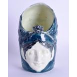 AN UNUSUAL SECESSIONIST MOVEMENT PORCELAIN PEN POT in the form of a stylised female portrait. 13.5