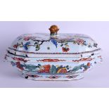 AN 18TH CENTURY FRENCH ROUEN TIN GLAZED EARTHENWARE TUREEN AND COVER painted with urns and