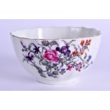 AN 18TH CENTURY WORCESTER SCALLOPED TEABOWL painted in enamel with flowers. 7.5 cm wide.