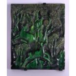 A LARGE FRENCH ART DECO MALACHITE POTTERY TILE decorated in relief with two deer roaming amongst