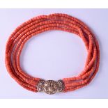 AN 18CT GOLD MOUNTED CORAL NECKLACE. 110 grams. Each strand 80 cm long, each bead 0.3 mm wide.