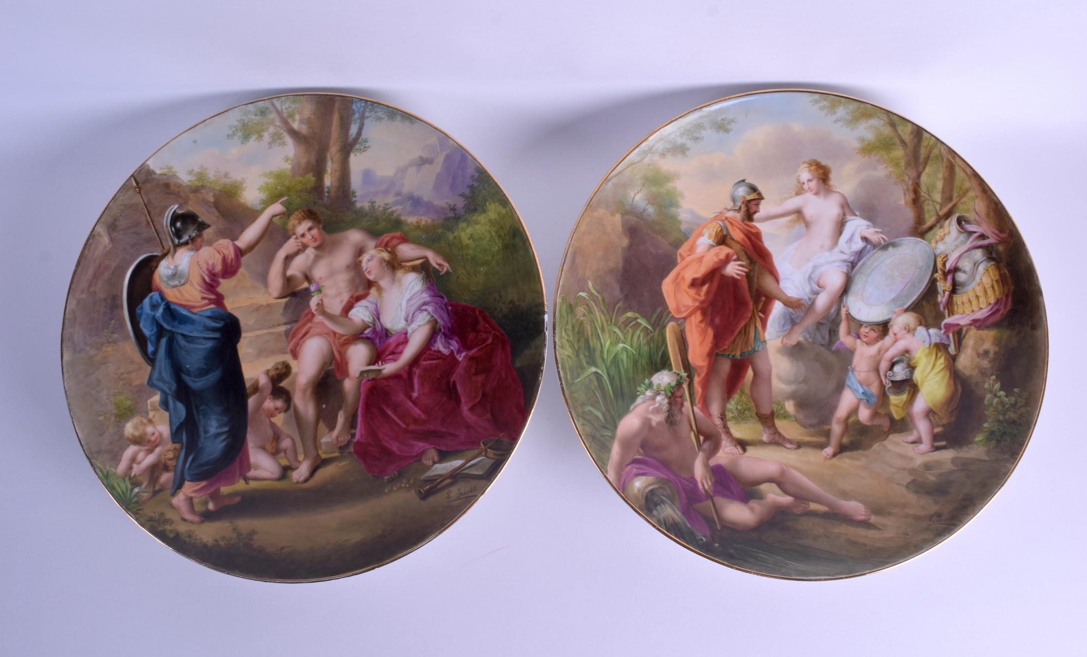 A GOOD PAIR OF VIENNA PORCELAIN DISHES painted with classical figures within landscapes. 32 cm