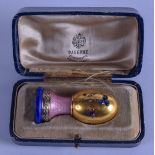 A LOVELY 14CT GOLD RUSSIAN GOLD LAPIS LAZULI AND PINK ENAMEL EGG. 5.5 cm high.