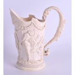 A LOVELY 19TH CENTURY EUROPEAN CARVED IVORY EWER decorated with classical figures dancing within