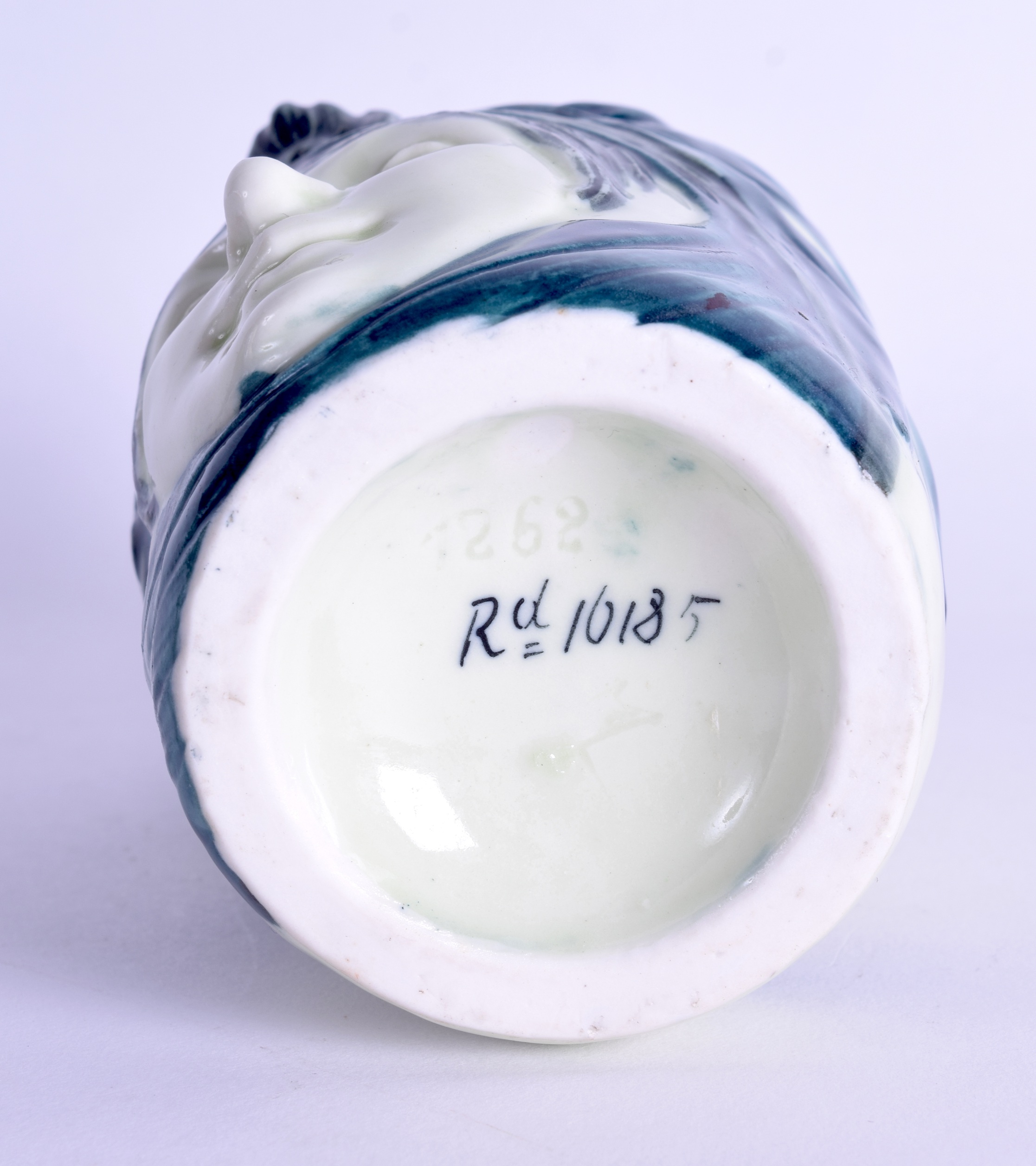AN UNUSUAL SECESSIONIST MOVEMENT PORCELAIN PEN POT in the form of a stylised female portrait. 13.5 - Image 3 of 3