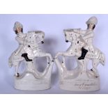 A LARGE PAIR EARLY 20TH CENTURY STAFFORDSHIRE POTTERY FIGURES, formed as males on the backs of
