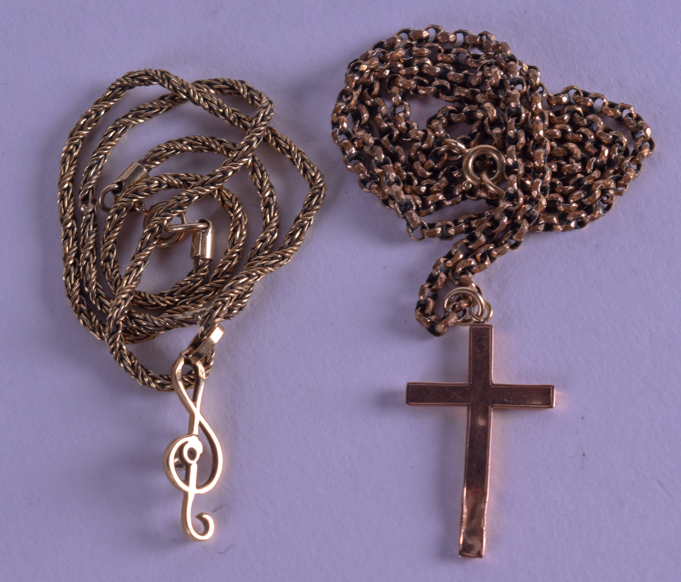 A 9CT GOLD CROSS on chain, together with a 9ct gold chain with musical note pendant. 14.9 grams. ( - Image 2 of 2