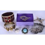 A SMALL GROUP OF COSTUME JEWELLERY, including a spider brooch and filigree butterfly. (qty)