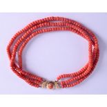 AN 18CT GOLD MOUNTED CORAL NECKLACE. 73 grams. Each strand 36 cm long, each bead 0.3 mm wide.