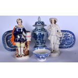 A BLUE AND WHITE POTTERY VASE AND COVER, together with two Staffordshire figures etc. (6)