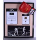 A SIGNED FRANK BRUNO BOXING GLOVE, together with a signed picture by Henry Cooper. 64 cm x 53 cm.