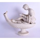 A LARGE 19TH CENTURY PARIANWARE FIGURE OF A SEATED MALE modelled resting upon an oil lamp upon a