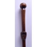 AN EARLY 20TH CENTURY AFRICAN CARVED HARDWOOD TRIBAL STAFF with portrait to centre stem. 91 cm