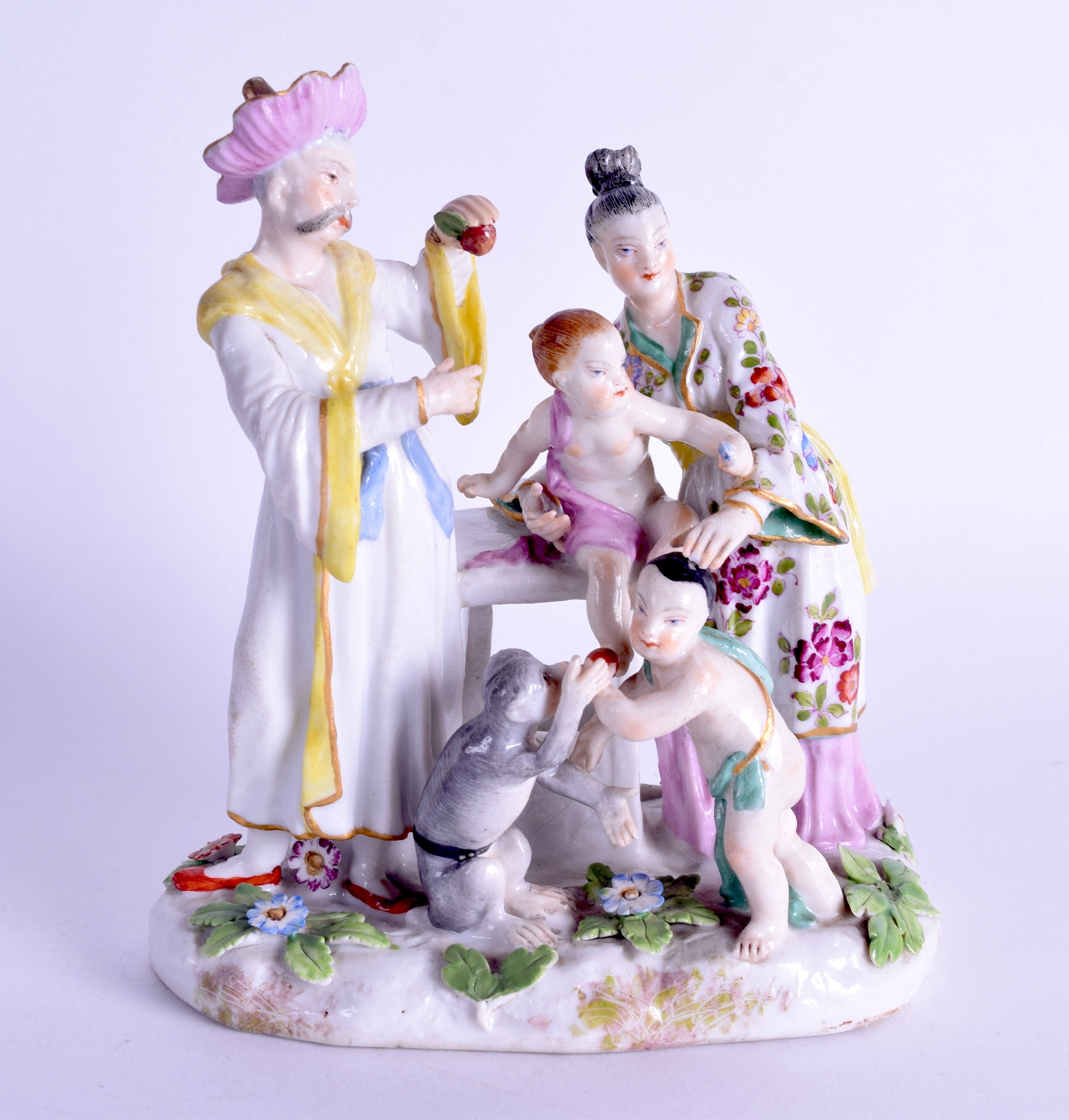AN 18TH/19TH CENTURY GERMAN PORCELAIN FIGURAL GROUP probably Sitzendorf, modelled as Chinese figures