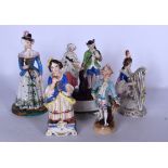 A GROUP OF FIVE PORCELAIN FIGURINES, one formed as a female with an elongated head playing a harp.