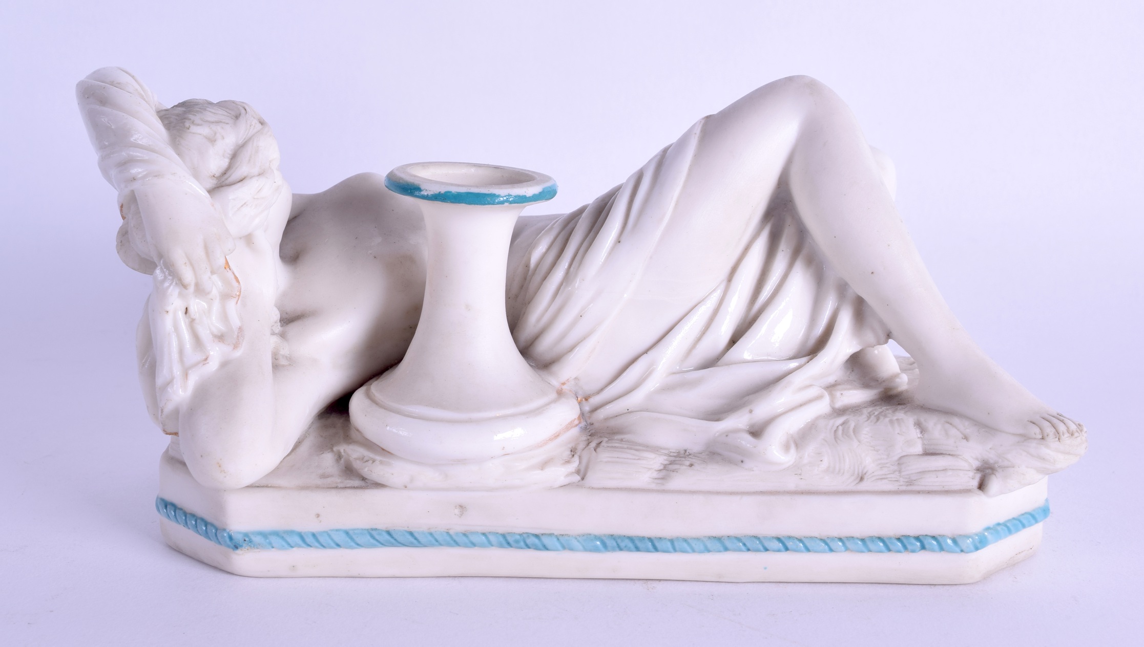 A 19TH CENTURY PARIANWARE FIGURE OF A SLEEPING FEMALE modelled reclining upon an octagonal base. - Image 2 of 3