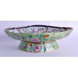 A 19TH CENTURY CHINESE FAMILLE ROSE LOBED PORCELAIN DISH Daoguang mark and period, painted with