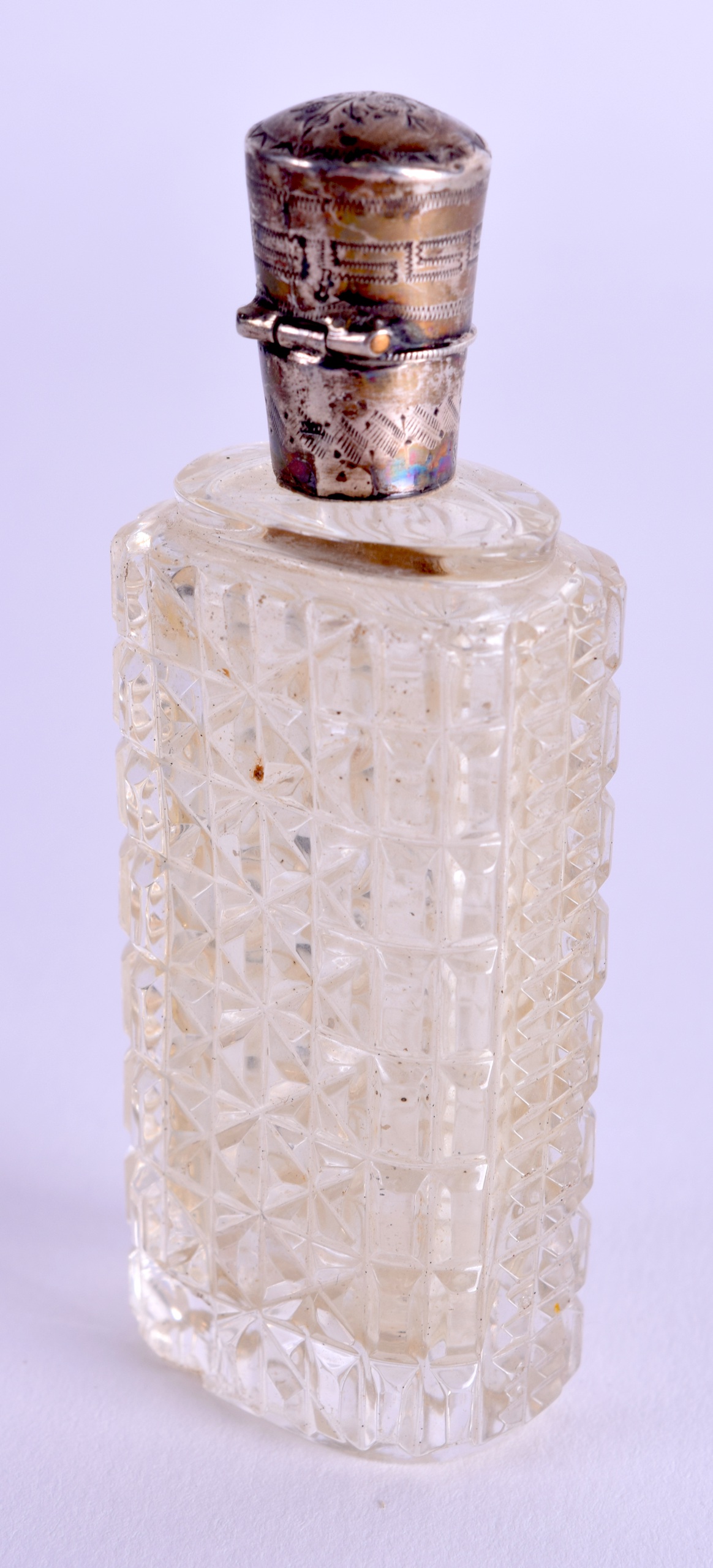 A 19TH CENTURY FRENCH SILVER AND GLASS SCENT BOTTLE. 9.5 cm high.