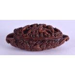 A MID 19TH CENTURY CONTINENTAL CARVED COQUILLA NUT SNUFF BOX. 8 cm x 4.5 cm.