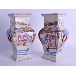 A PAIR OF CHINESE REPUBLICAN PERIOD FAMILLE ROSE VASES bearing Qianlong marks to base, painted