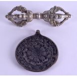 A 19TH CENTURY CHINESE TIBETAN BRONZE PENDANT together with a phurba. Pendant 5 cm wide, phurba 9 cm