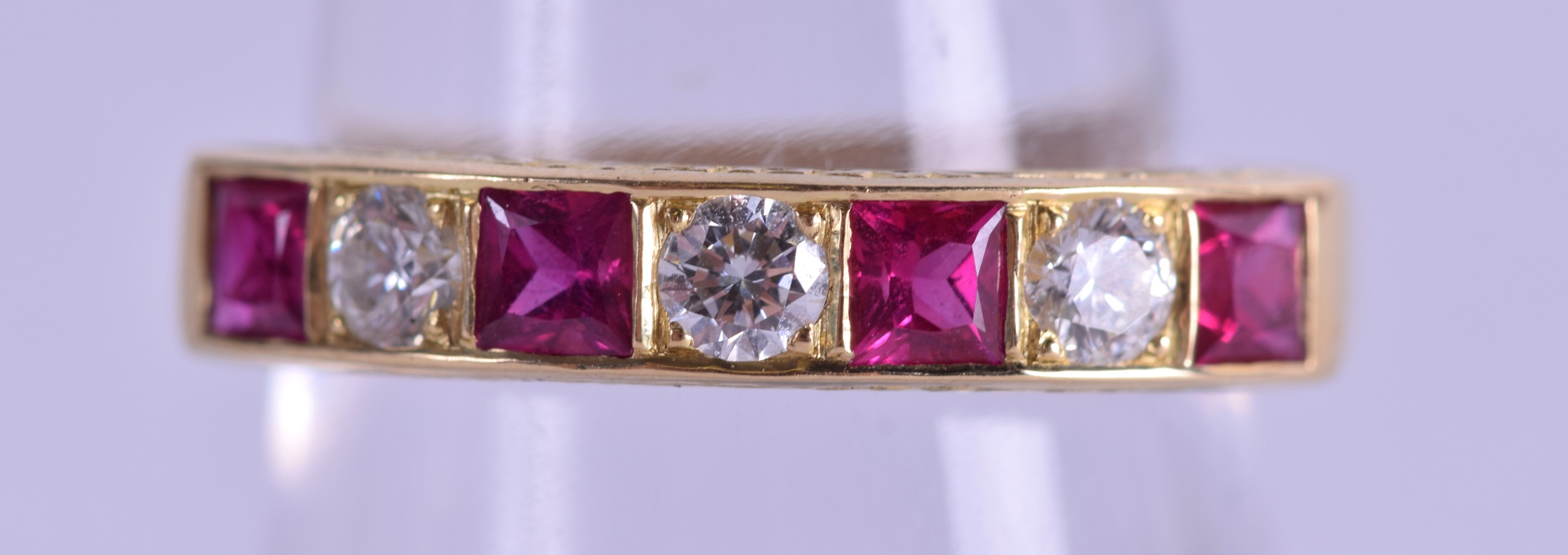 A GOOD 18CT GOLD RUBY AND DIAMOND RING. 5.5 grams. Size Q.