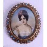 AN EARLY 20TH CENTURY CONTINENTAL PAINTED IVORY PORTRAIT MINIATURE within a jewelled frame. Image