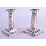 A PAIR OF 1960S ENGLISH SILVER CANDLESTICKS. Sheffield 1964. 13 cm high.