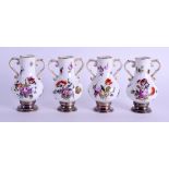 A SET OF FOUR LATE 19TH CENTURY CONTINENTAL PORCELAIN VASES with silver mounts. 7 cm high. (4)