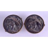 AN UNUSUAL PAIR OF VICTORIAN BUTTONS.