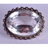 A STYLISH ARTS AND CRAFTS SILVER AND CRYSTAL BROOCH. 5 cm x 4.25 cm.