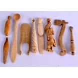 AN UNUSUAL GROUP OF 19TH CENTURY CARVED BONE SPOONS in various forms. (9)