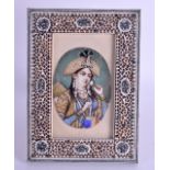 A 19TH CENTURY INDIAN PAINTED IVORY PORTRAIT MINIATURE depicting a female within a green interior.