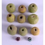 NINE EUROPEAN ANTIQUITY GLASS TOGGLES. (9)