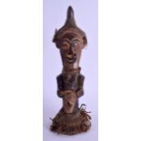 AN UNUSUAL EARLY 20TH AFRICAN DOUBLE SIDED FIGURE. 25 cm high.