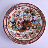 A VERY RARE FLIGHT BARR AND BARR PLATE painted with Oriental acrobats within a landscapes. 21 cm