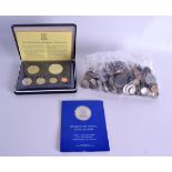 A COLLECTION OF INTERNATIONAL COINS some silver. (qty)